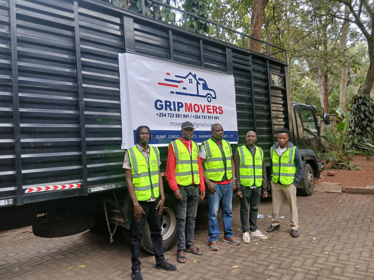 Grip Movers team setting up office furniture at new corporate location