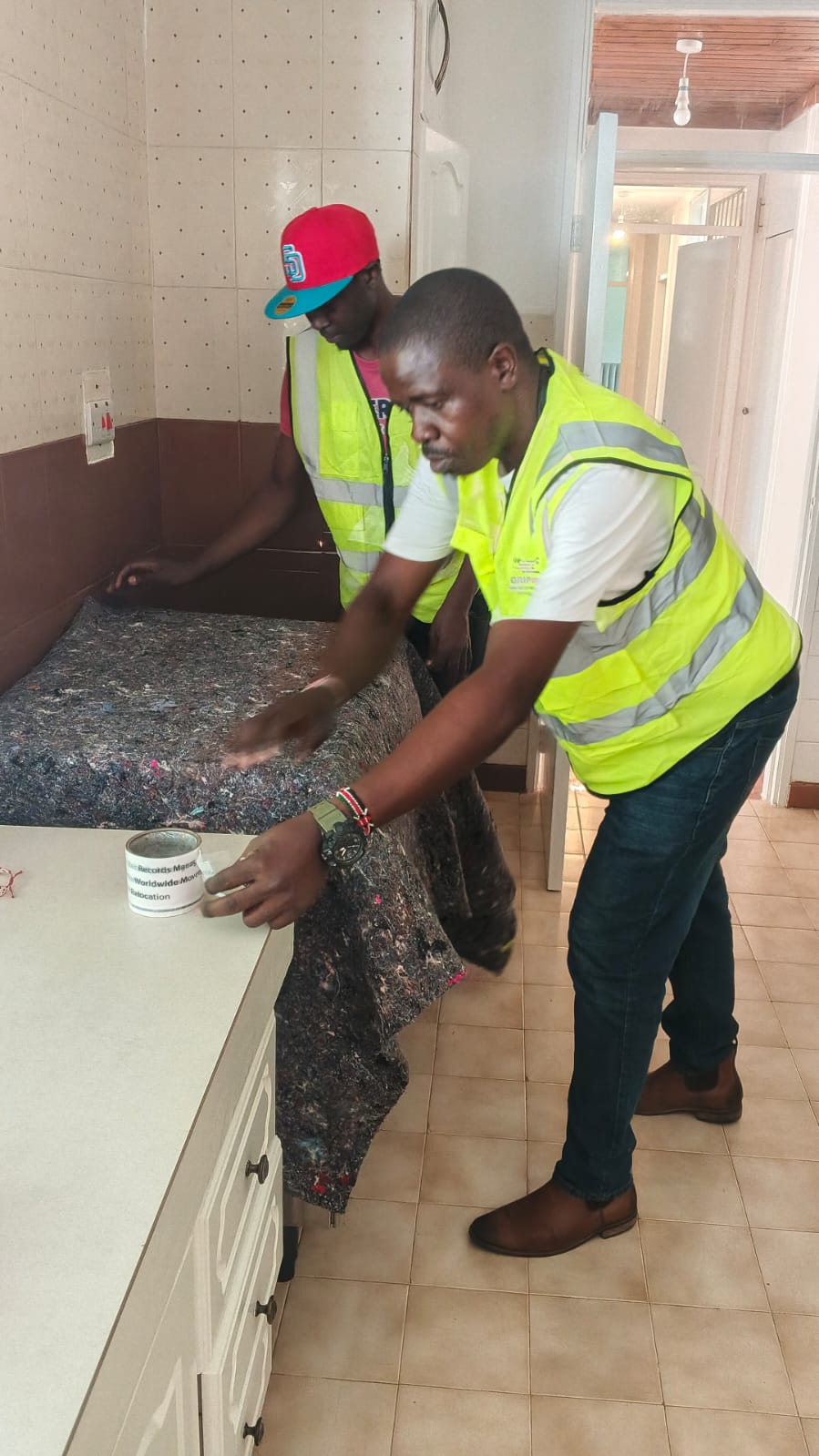 Grip Movers team professionally packing household items